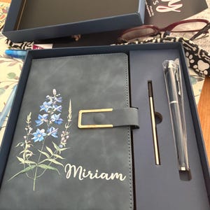 Laura added a photo of their purchase