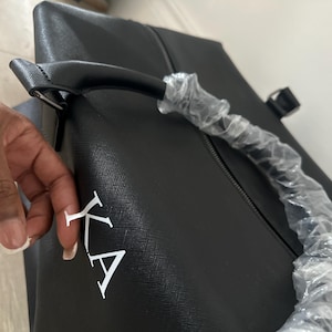 Kareen added a photo of their purchase
