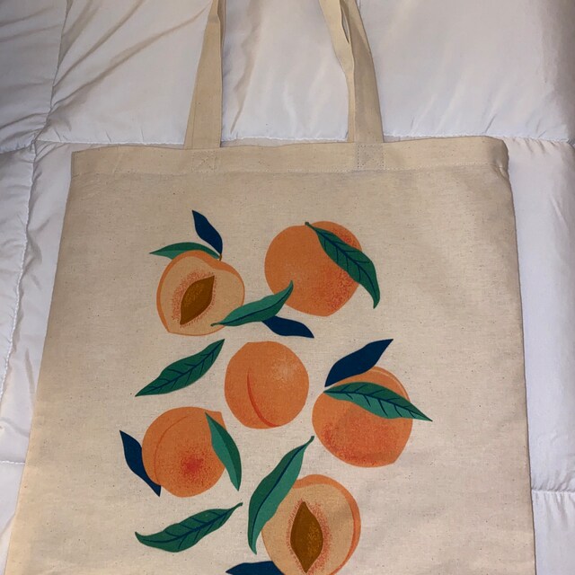 バッグ Flat Logo Tote peach Drawstring Pouch iap_640x640.
