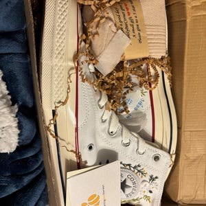 Mayla added a photo of their purchase