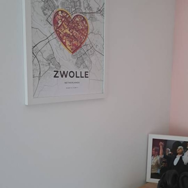 Lafayette, Indiana, a bridge over a river with buildings and a starry