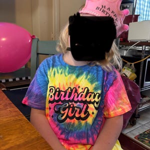 Liz added a photo of their purchase