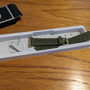 Sarah added a photo of their purchase