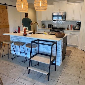 Luisa added a photo of their purchase