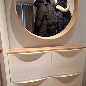 Nora added a photo of their purchase