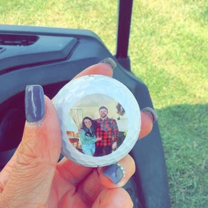 Sarah added a photo of their purchase