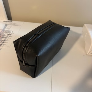 Taylor added a photo of their purchase