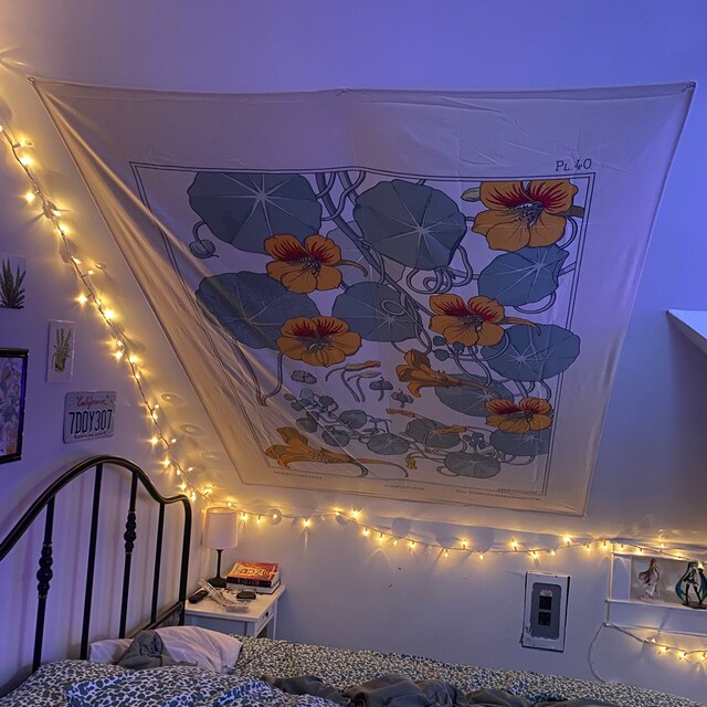 How to hang tapestry on slanted wall sale