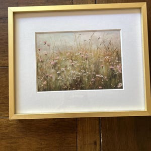Liz added a photo of their purchase