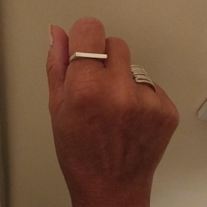 Gina added a photo of their purchase