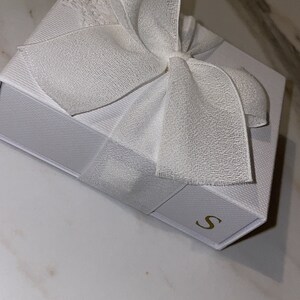 Priscilla added a photo of their purchase