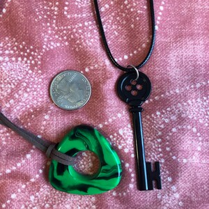 CORALINE Seeing Stone Necklace Looking 