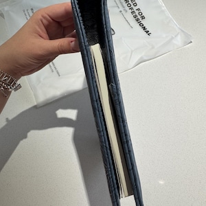 Tayane added a photo of their purchase