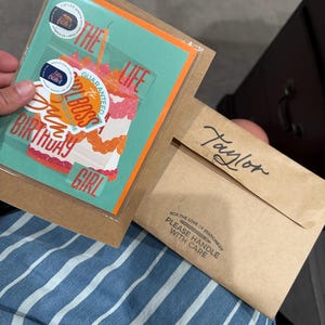 Taylor added a photo of their purchase