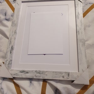 Anita added a photo of their purchase
