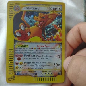 Charizard 146/144 Skyridge 2003- Wizards - English Version Charizard 146/144 Skyridge 2003- Wizards - English Version