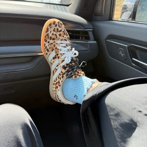Ashley added a photo of their purchase