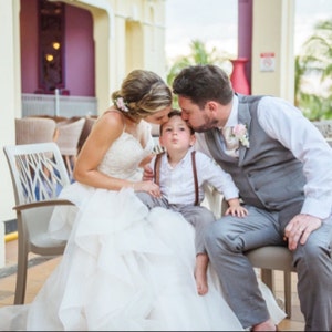 burgundy bow tie and suspenders wedding