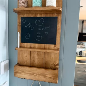 Elaine added a photo of their purchase