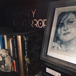 Taylor added a photo of their purchase