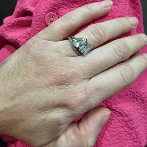 Caitlin added a photo of their purchase