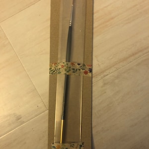 Sharon added a photo of their purchase