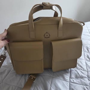Melinda added a photo of their purchase
