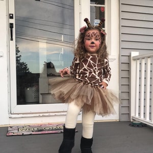 Costume da giraffa con cappuccio o poncho per bambini