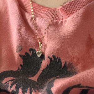 Caitlin added a photo of their purchase