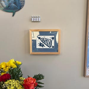 Sam added a photo of their purchase