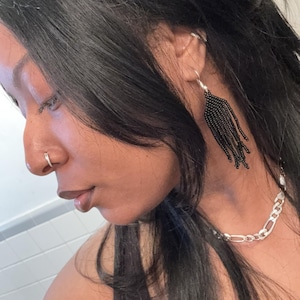 Aaliyah added a photo of their purchase