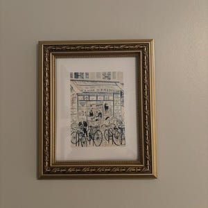 Sarah added a photo of their purchase