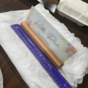 Katie added a photo of their purchase
