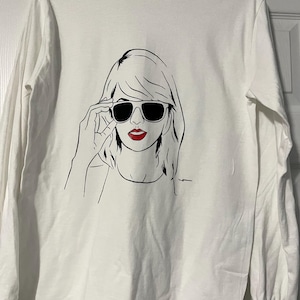 Sharon added a photo of their purchase