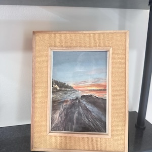 Sarah added a photo of their purchase