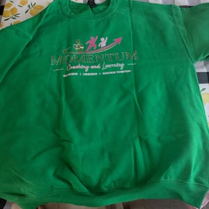 Brigid added a photo of their purchase