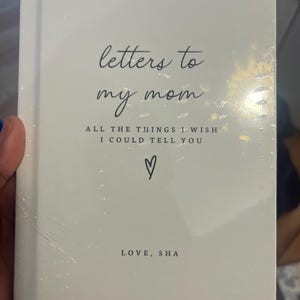Shaniqua added a photo of their purchase