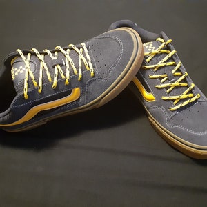 volt gold black laces
