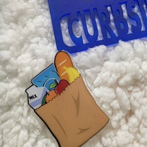 Angela added a photo of their purchase