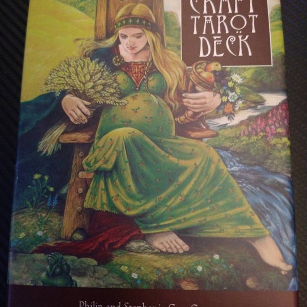 Tarot of the Sorceress deck laid out with mystical symbols and the Wheel of the Year