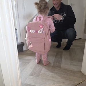 Katie added a photo of their purchase