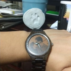 Adriana added a photo of their purchase
