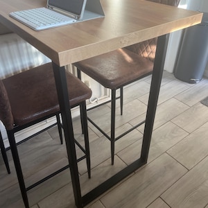 Elaine added a photo of their purchase