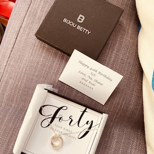 Naomi added a photo of their purchase