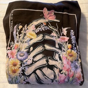 Teresa added a photo of their purchase