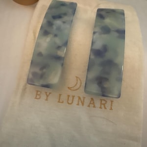 Leslie added a photo of their purchase