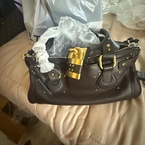 Sachini added a photo of their purchase