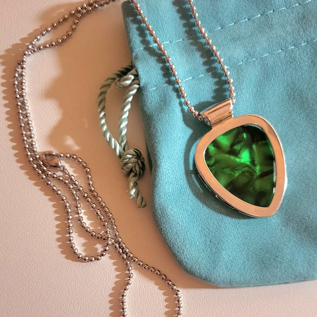 Collana con ciondolo per plettro per charra Porta bundle