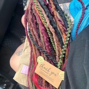Natasha added a photo of their purchase