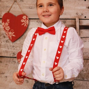blush pink suspenders and bow tie